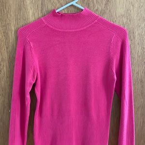pink turtleneck